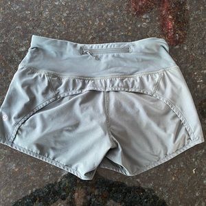 green lululemon speed up shorts